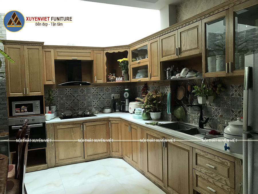 Hình ảnh tủ bếp bằng gỗ bị mối mọt nhà chị Chi - Tân Bình